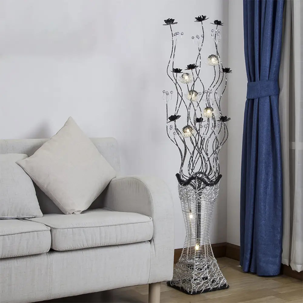metal table lamps with a matte black finish for a sleek appearancemetal table lamps with a matte black finish for a sleek appearanceContemporary Torch-Like LED Floor Light with Curvy Arm and Floret Decor in Black/Silver metal table lamps with a matte black finish for a sleek appearancemetal table lamps with a matte black finish for a sleek appearanceContemporary Torch-Like LED Floor Light with Curvy Arm and Floret Decor in Black/Silver