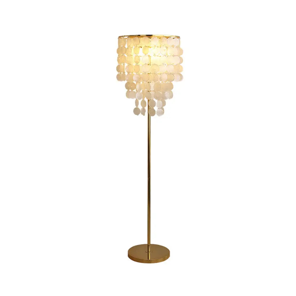 mid century modern table lamps with iconic designs for a stylish studymid century modern table lamps with iconic designs for a stylish studyClassic Gold Shell Floor Lamp with Cascading Lighting for Living Room